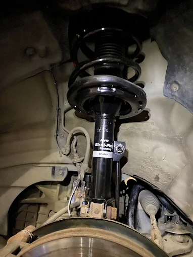 Front brakes and suspension strut replacement