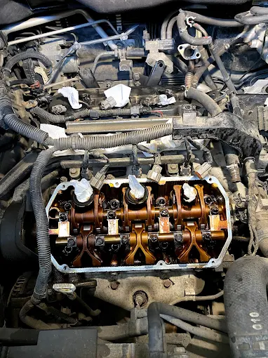 Valve cover gasket and spark plug tube seals replacement